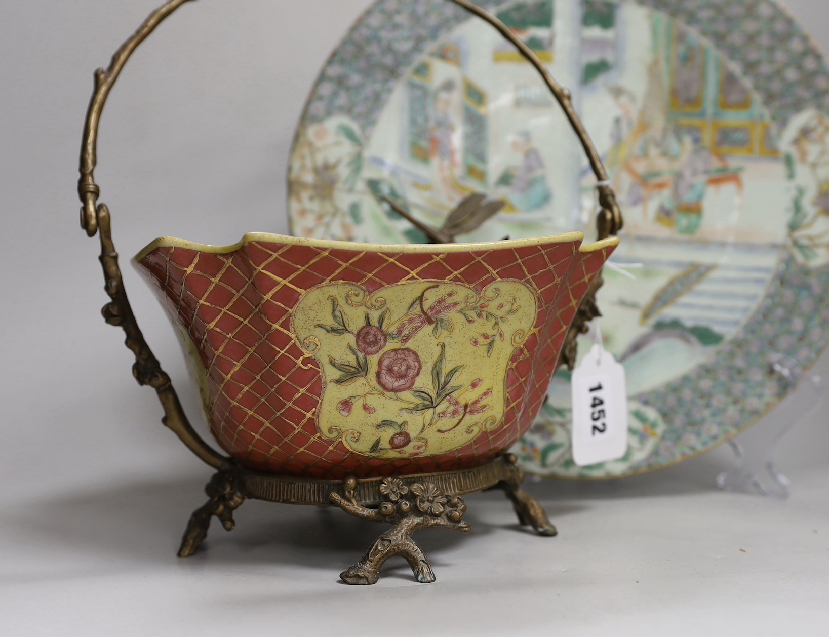 A 19th century Chinese famille verte plate, a Shirvan incense burner, a pottery pillow and a metal mounted bowl 32cm high (4)